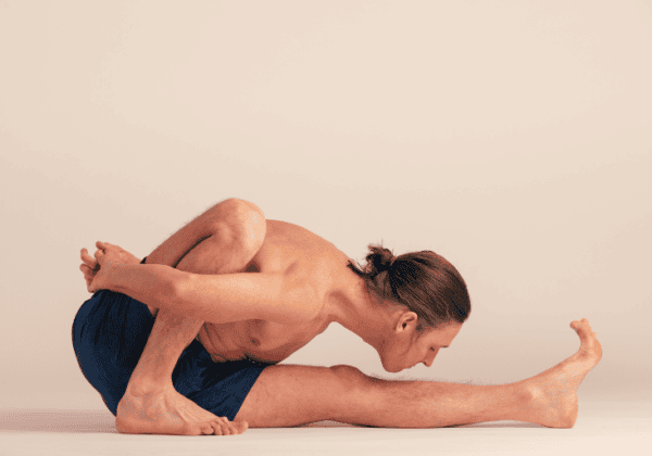 adam keen in yoga posture
