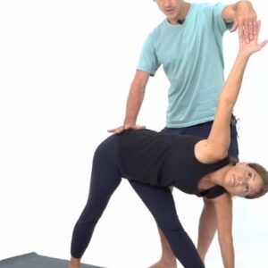 adam keen giving ashtanga yoga assists
