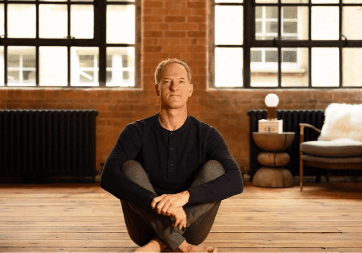 jason crandell yoga teacher in a studio sitting