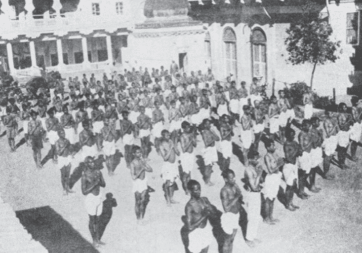 indian boys doing surya namaskar